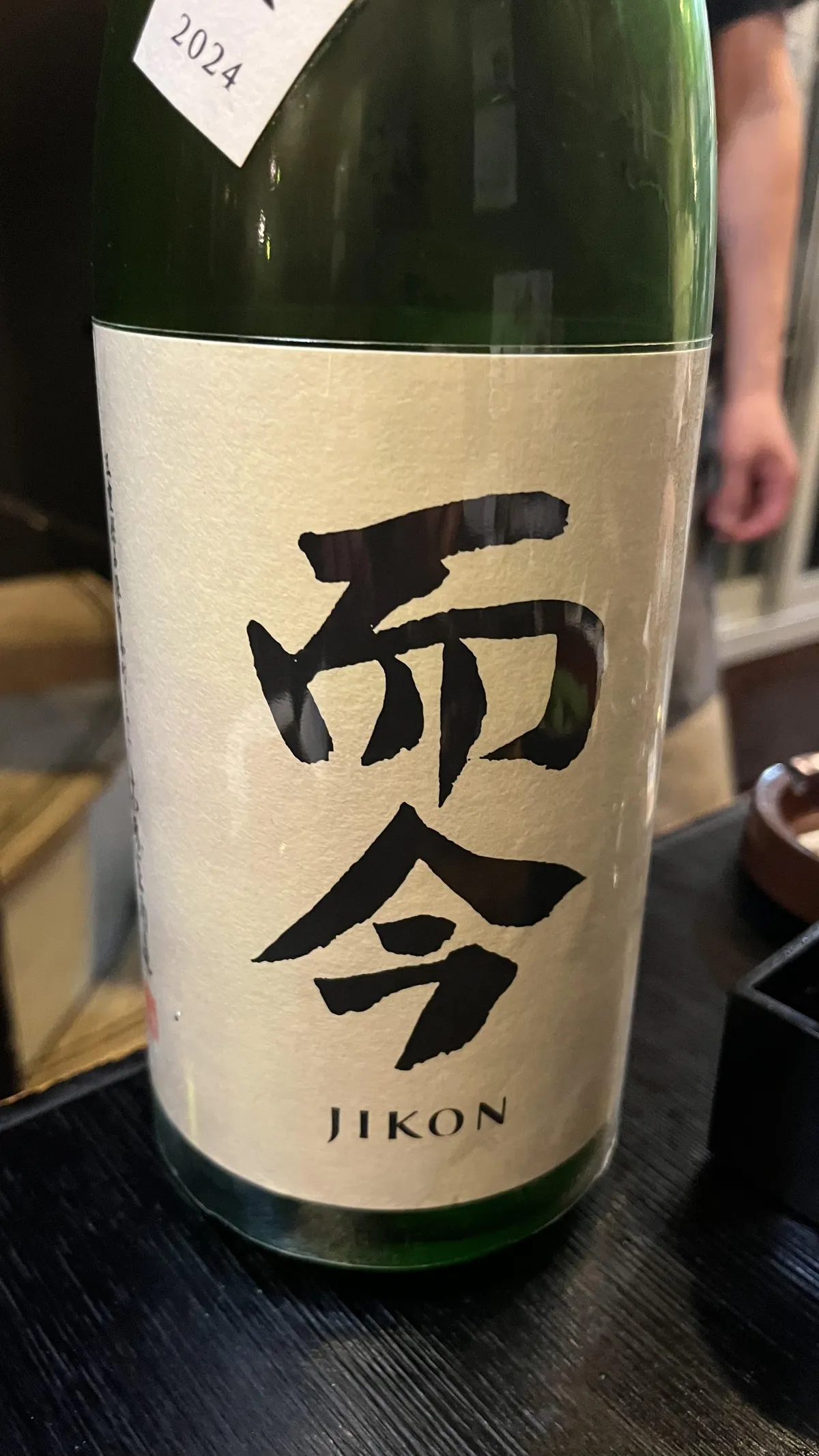 「而今」と力強く書かれたラベルが印象的な木屋正酒造の日本酒ボトル